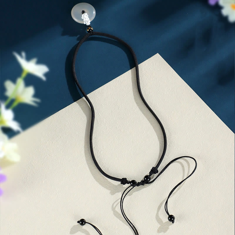 White Agate Peace Buckle Pi Xiu Silver Pendant – White agate PiXiu pendant worn on neck black cord everyday feng shui