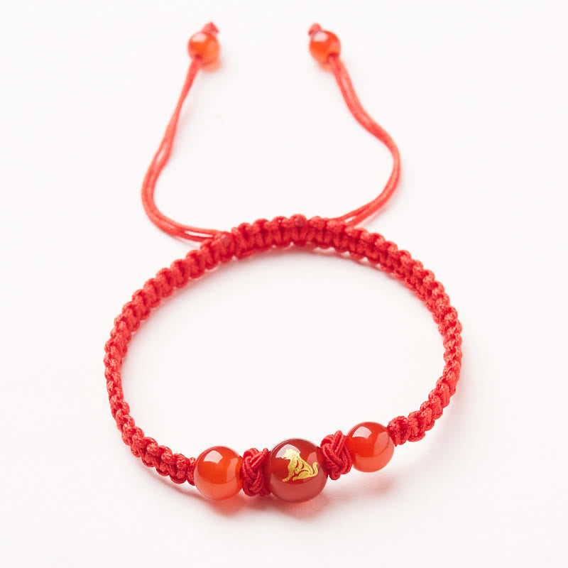 Red Agate Zodiac Red String Bracelet – gold horse zodiac carnelian beads flat lay, Energetic