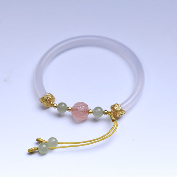 White Agate Lotus Hetian Jade Bracelet – pink lotus carved bead on lavender jade band, balanced