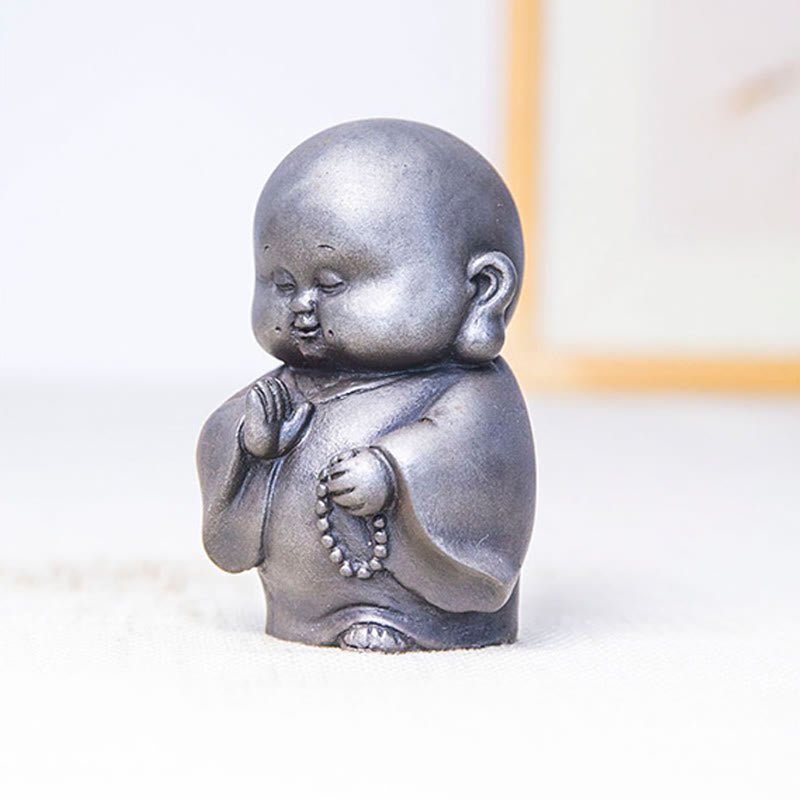 Little Monk Iron Powder Resin Statue – holding prayer beads mala, counting mantra meditation