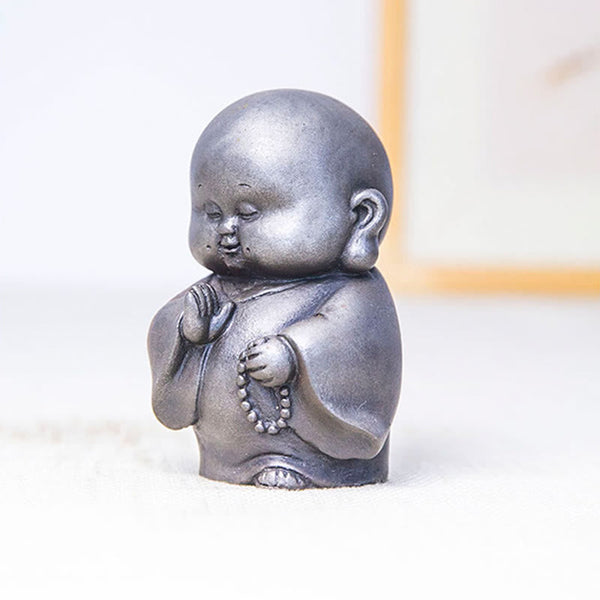 Little Monk Iron Powder Resin Statue – holding prayer beads mala, counting mantra meditation