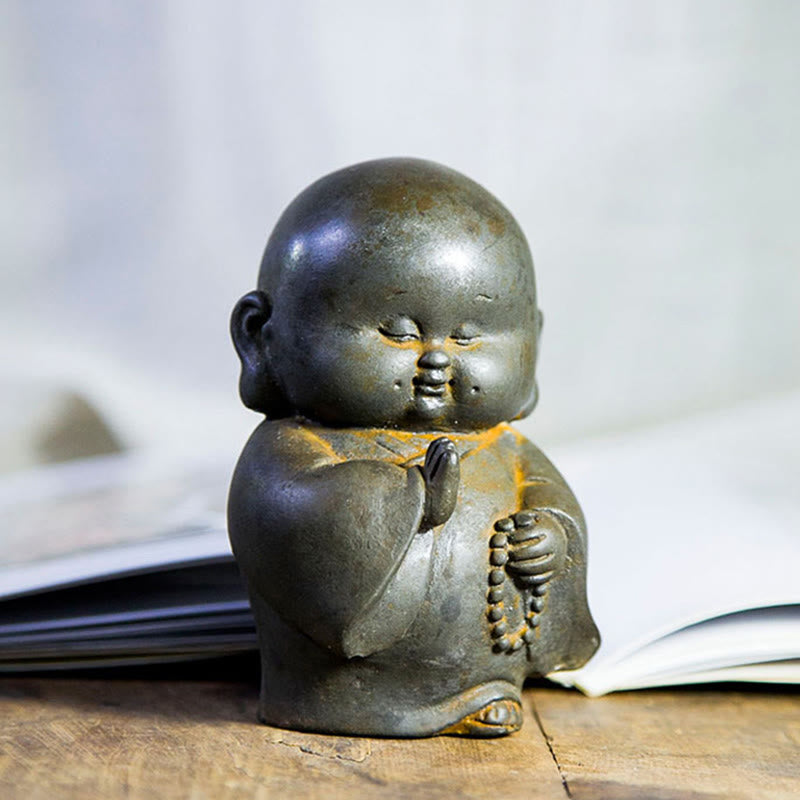 Little Monk Iron Powder Resin Statue – sleeping reclined pose, peaceful rest mindfulness statue