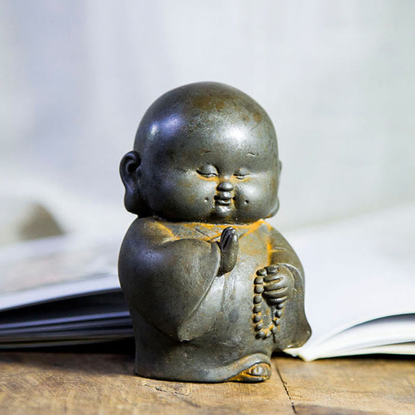 Little Monk Iron Powder Resin Statue – sleeping reclined pose, peaceful rest mindfulness statue