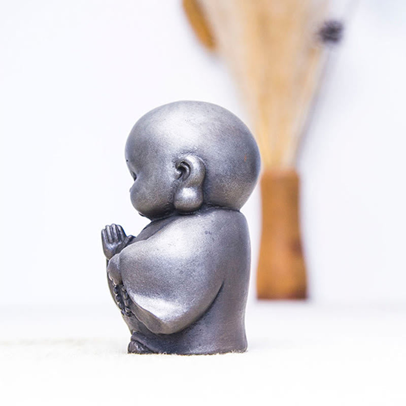 Little Monk Iron Powder Resin Statue – base with anti-slip pad, stable placement on smooth surface