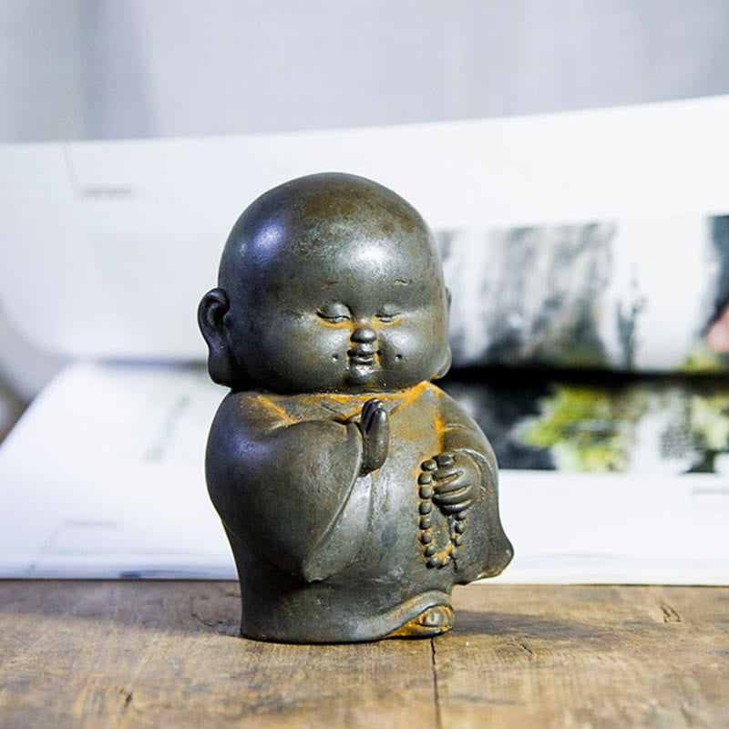 Little Monk Iron Powder Resin Statue – reading sutra pose with scroll, wisdom learning figurine