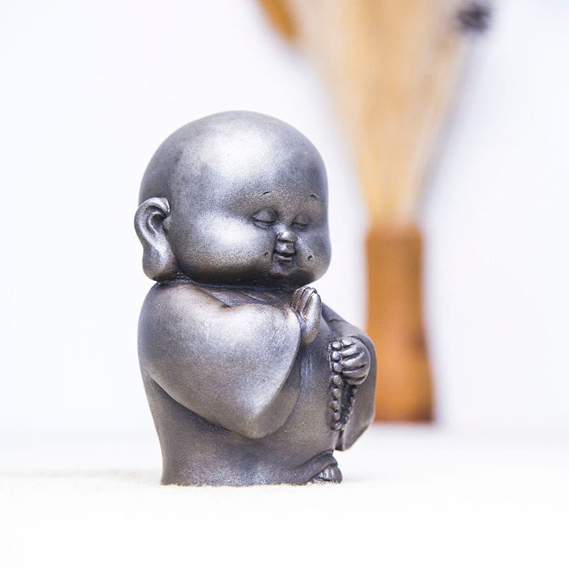 Little Monk Iron Powder Resin Statue – birthday gift arrangement with flowers, celebration setup