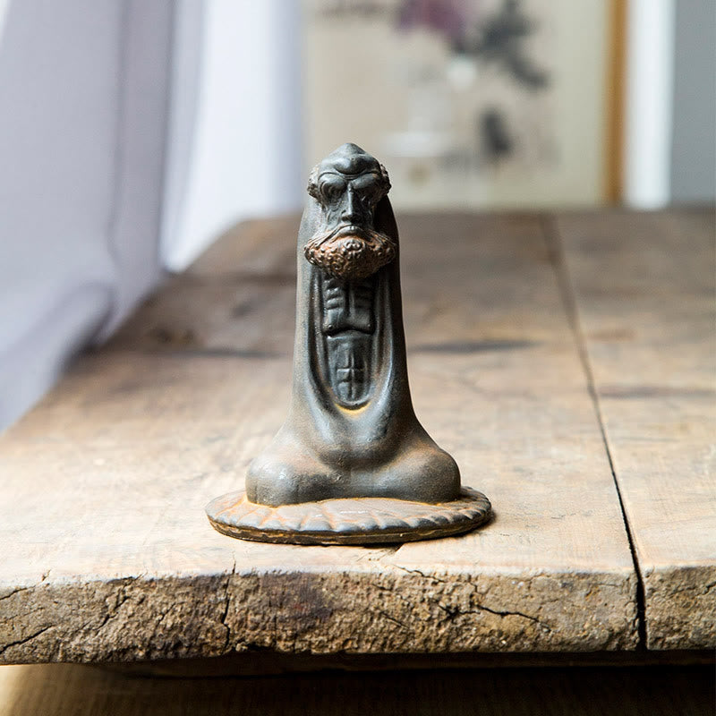 Bodhidharma Iron Powder Resin Statue – seated monk figure in rust finish, Zen mindfulness home decor