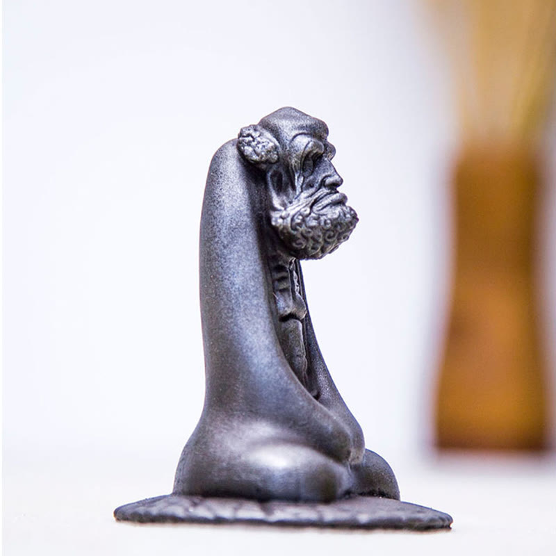 Bodhidharma Iron Powder Resin Statue – comparison with soda can for scale, compact desktop size