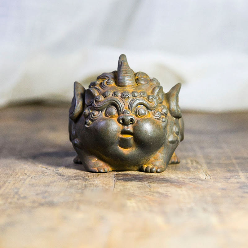 Handmade PiXiu Iron Powder Rust Cast Resin Wealth Statue – Front view of rusted PiXiu on rustic wood surface antique decor