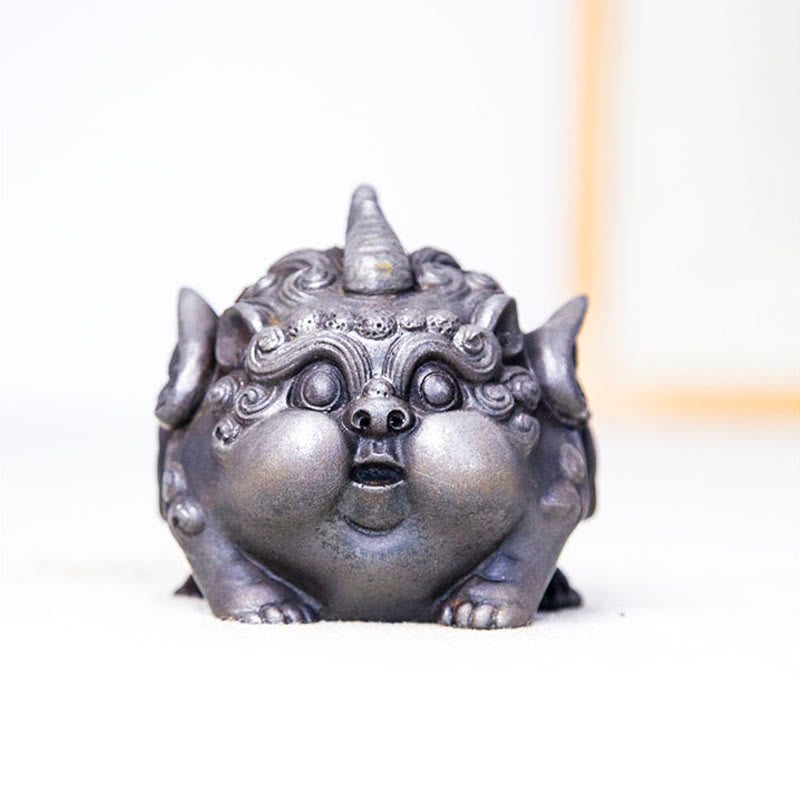 Handmade PiXiu Iron Powder Rust Cast Resin Wealth Statue – Silver PiXiu front view with warm wood element blurred background