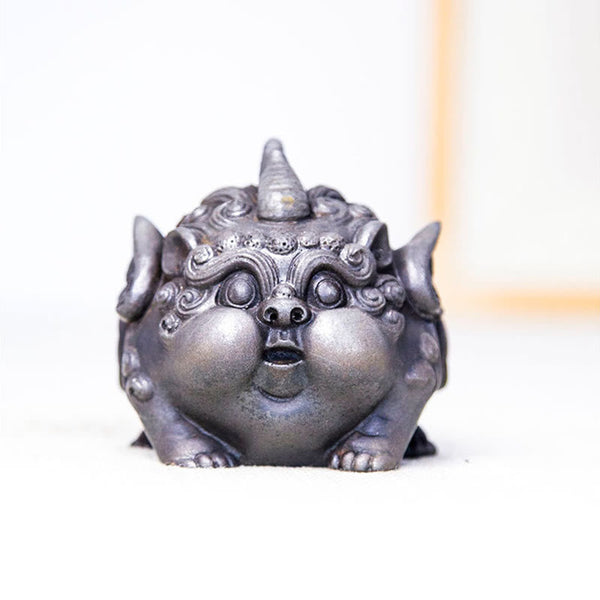 Handmade PiXiu Iron Powder Rust Cast Resin Wealth Statue – Silver PiXiu front view with warm wood element blurred background