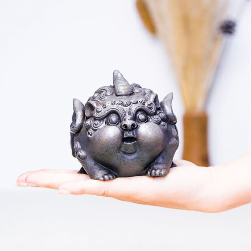 Handmade PiXiu Iron Powder Rust Cast Resin Wealth Statue – Single hand palm presenting silver PiXiu showing portable size