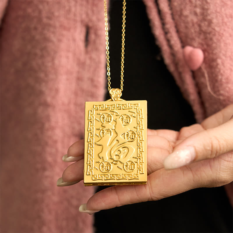 Dragon Hetian Jade Necklace | Strength – Fu blessing character pendant with jade stone, held by hand, auspicious