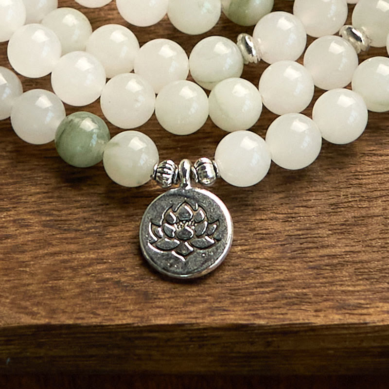 108 Mala Tianshan Jade Lotus Bracelet - layered strands on walnut wood, silver lotus focal, natural jade tone