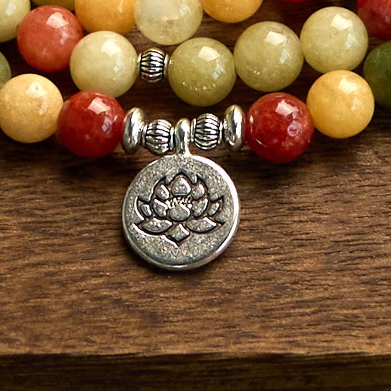 108 Mala Topaz Jasper Lotus Bracelet - detailed silver lotus charm with red and green stone beads, balance
