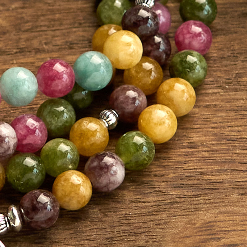 108 Mala Tourmaline Lotus Wisdom Bracelet - natural stone bead texture close-up, multicolor, Protection