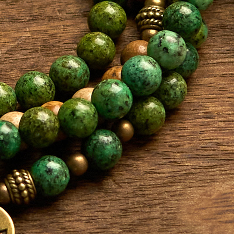 108 Mala Picture Jasper Turquoise Lotus Bracelet - turquoise beads with brass spacers on wood grain, Stability