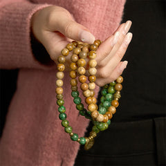 108 Mala Picture Jasper Turquoise Lotus Bracelet - cradled in both hands, brass lotus charm, Stability