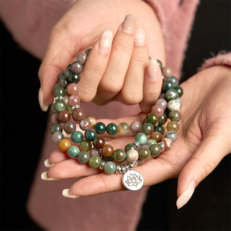 Indian Agate Lotus Mala Bracelet - held in hands, serene