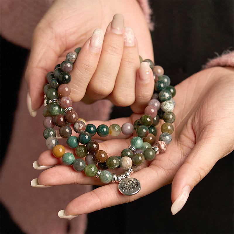 Indian Agate Lotus Mala Bracelet - multi-color beads in hands, natural