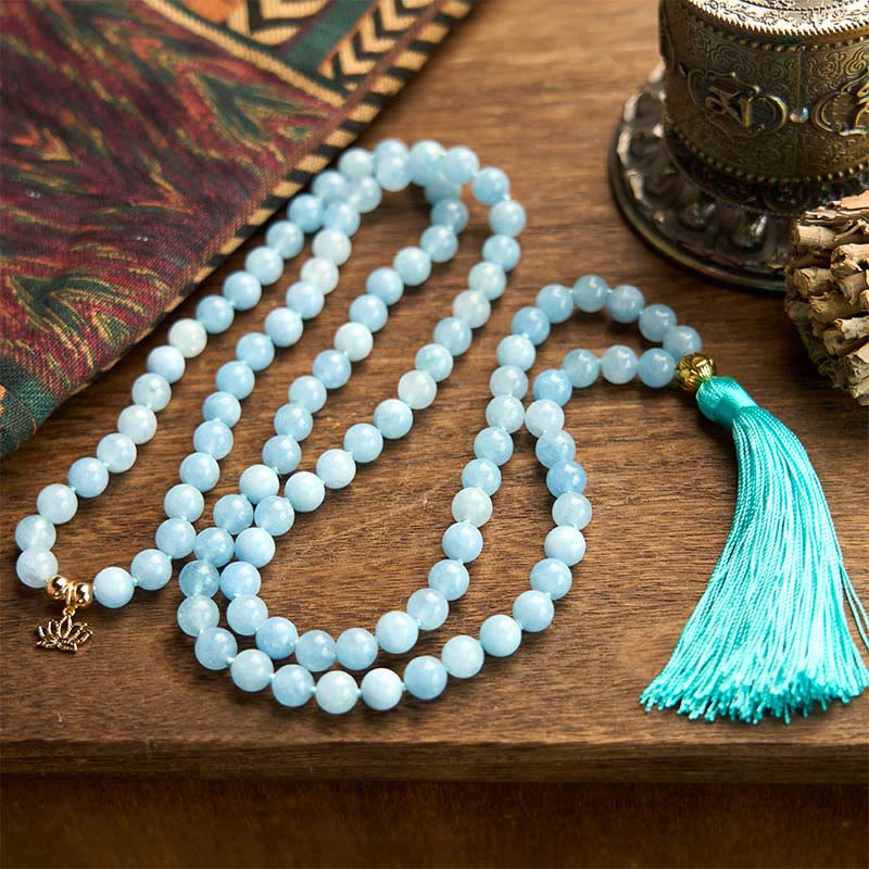 108 Mala Aquamarine Lotus Healing Bracelet – looped pale blue beads with gold lotus charm and teal tassel, Peace