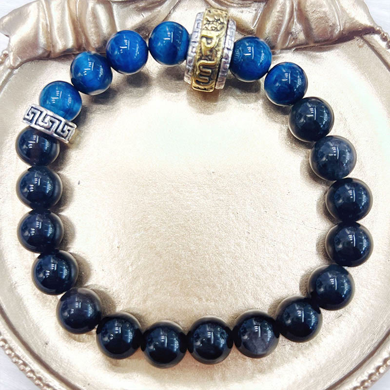 Om Mani Padme Hum Bracelet – Full circle view on gold dish, obsidian and blue tiger eye beaded bracelet