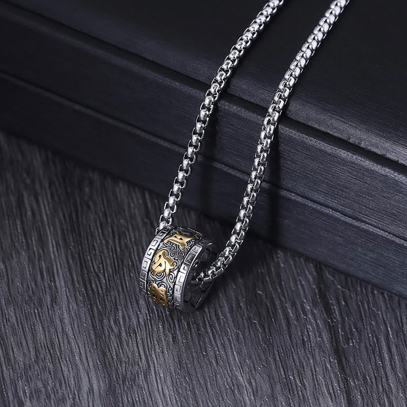 Om Mani Padme Hum Necklace – close-up on dark wood, Tibetan prayer pendant