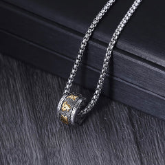 Om Mani Padme Hum Necklace – close-up on dark wood, Tibetan prayer pendant