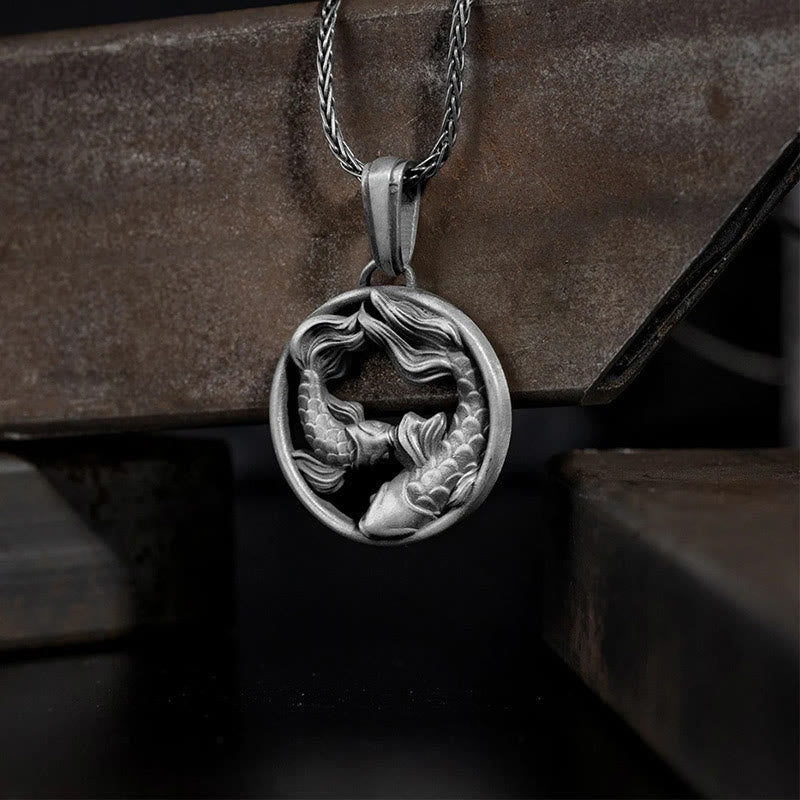 Pure Tin Double Koi Fish Wealth Pendant – twin koi yin-yang openwork on braided chain over rusted metal, lucky necklace