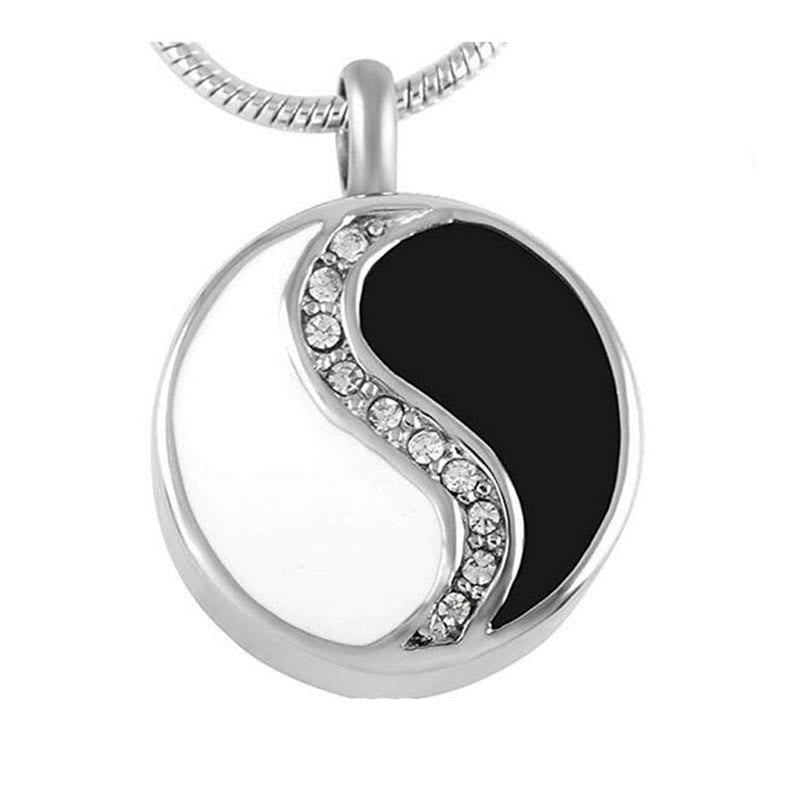 Yin Yang Necklace - Close-up circular yin-yang pendant with crystal divider, silver finish