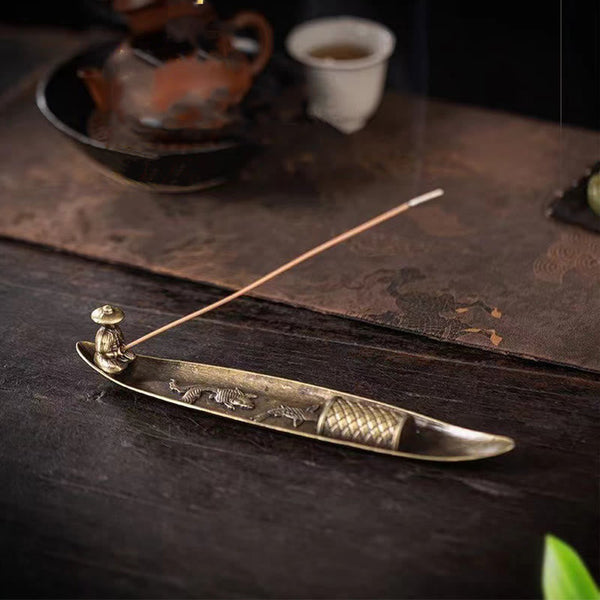 Koi Fish Boat Incense Burner - bronze boat with fisherman and burning incense, tea ceremony setting