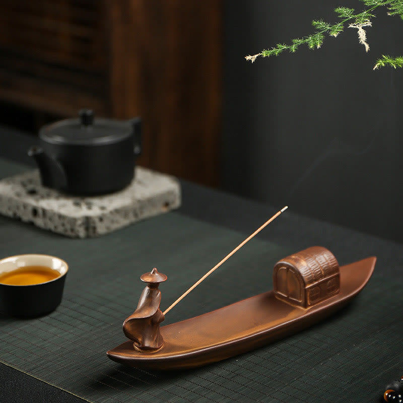 Buddha Hand Lotus Ceramic Incense Burner – incense stick placed in lotus hand holder, smoke rising
