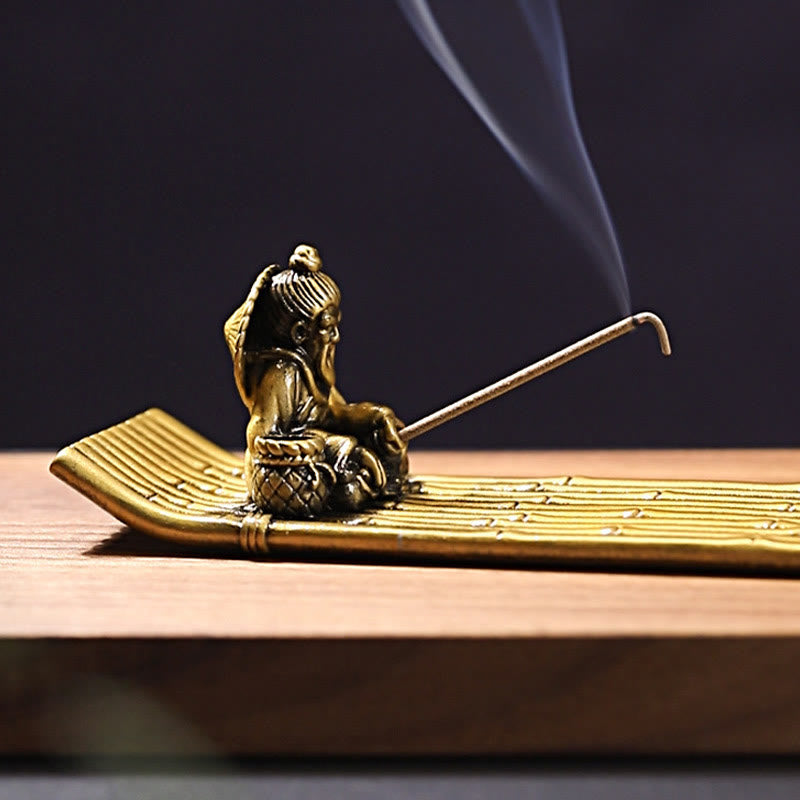 Bamboo Fishing Boat Alloy Incense Burner – close up fisherman figure with basket and smoke, storytelling craftsmanship