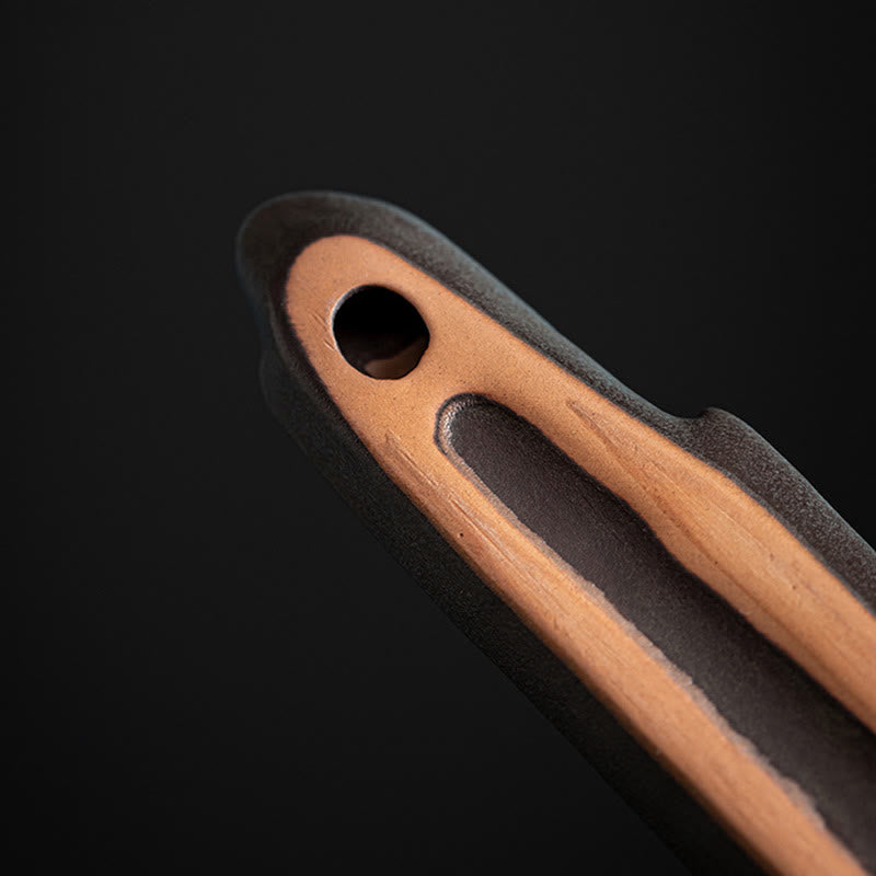 Mountains Boat Ceramic Incense Burner – macro detail of ceramic incense hole and brown textured glaze finish