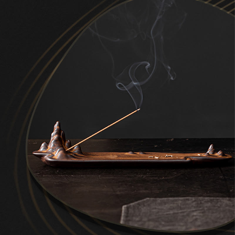 Mountains Boat Ceramic Incense Burner – artistic golden circle frame with brown mountain burner and elegant incense smoke