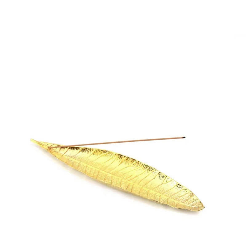 Oriental Leaf Alloy Incense Burner – gold leaf incense holder on white background, luxurious botanical accent piece