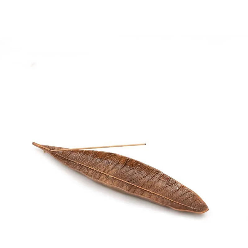 Oriental Leaf Alloy Incense Burner – brown leaf incense holder on white background, organic minimalist form