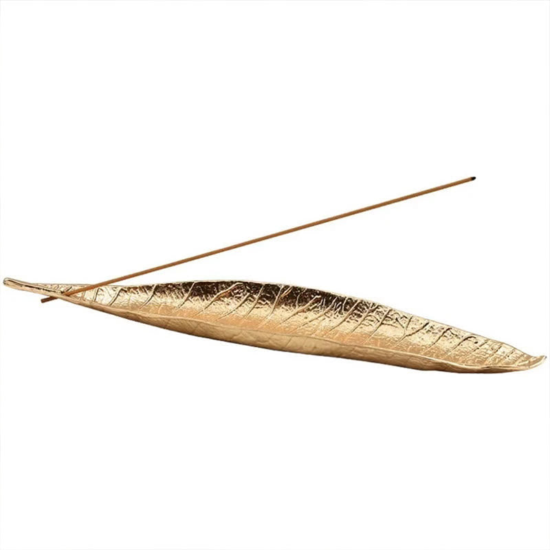 Oriental Leaf Alloy Incense Burner – gold leaf incense holder isolated on white, sleek nature inspired design