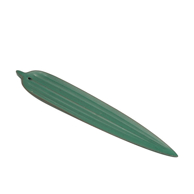 Green Bamboo Leaf Ceramic Incense Burner – dark green leaf-shaped ceramic holder on white background, sleek nature design