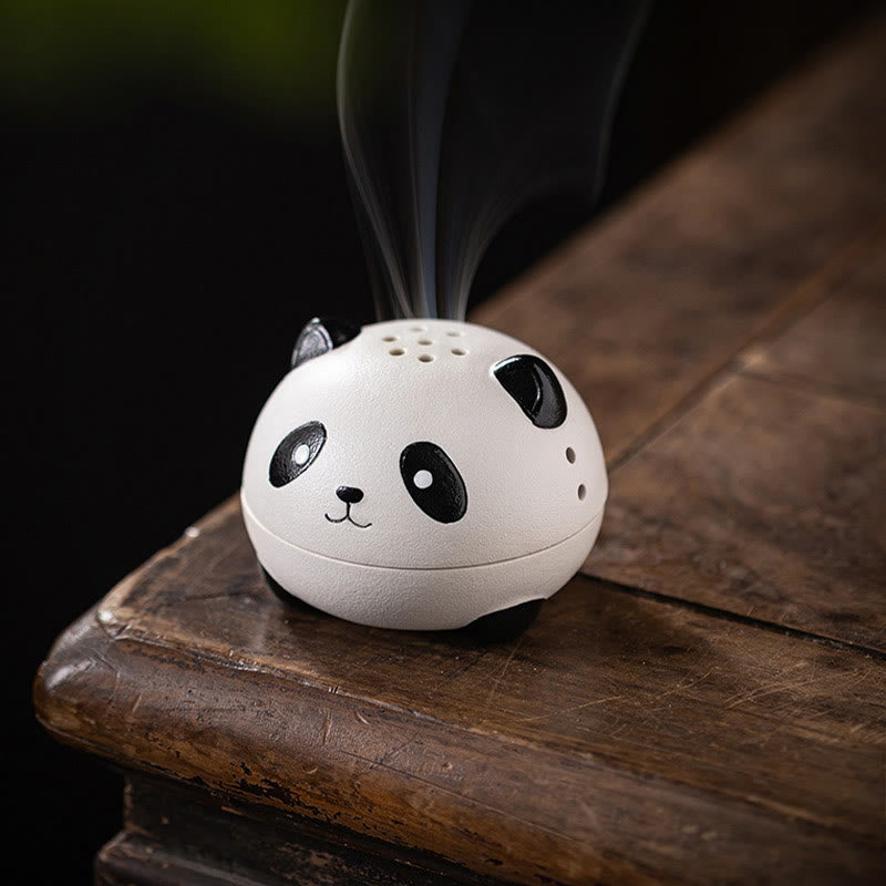 Cute Panda Ceramic Incense Burner – Panda head on aged wood edge with wisps of smoke, moody dark backdrop