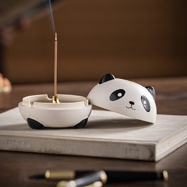 Cute Panda Ceramic Incense Burner – Open panda on white book with upright stick incense, brass holder visible