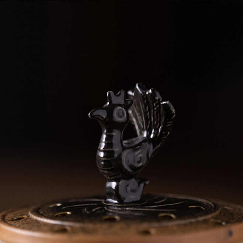 Sanxingdui Ceramic Incense Burner – close up of black phoenix bird finial on perforated lid, mythical guardian detail