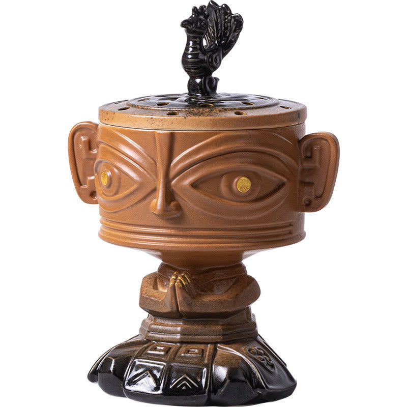 Sanxingdui Ceramic Incense Burner – studio front view of yellow mask ceramic burner with phoenix lid, collectible art piece