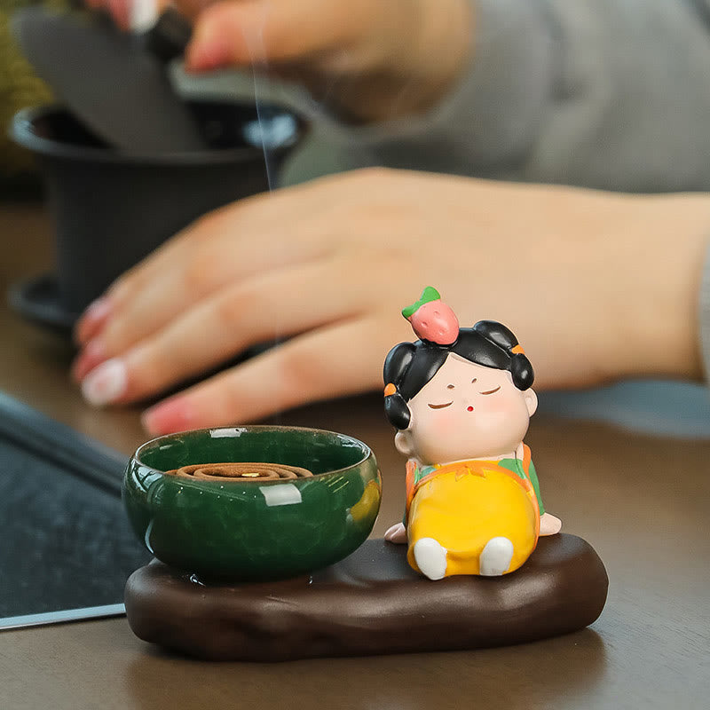 Tang Dynasty Lady Ceramic Incense Burner – Coil incense burning in green bowl with relaxed strawberry lady