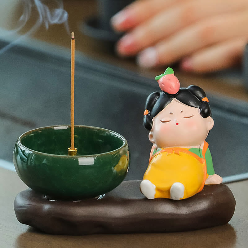 Tang Dynasty Lady Ceramic Incense Burner – Strawberry lady napping beside green bowl, incense smoke rising