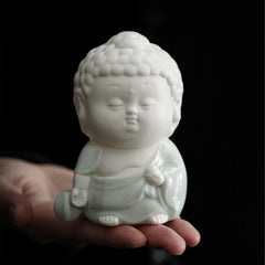 Ceramic Buddha Incense Burner – smoke cascading down Buddha face into lotus pool