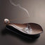 Brown Ceramic Lotus Pod Zen Incense Burner - bronze lotus leaf with meditating figure relief, meditative