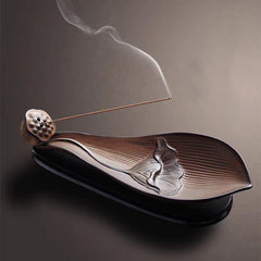 Brown Ceramic Lotus Pod Zen Incense Burner - bronze lotus leaf with meditating figure relief, meditative