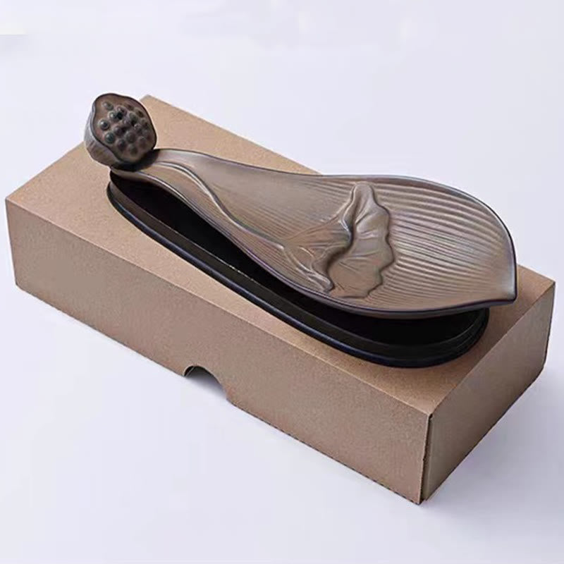 Brown Ceramic Lotus Pod Zen Incense Burner - earthy brown leaf on black base, packaging display, natural