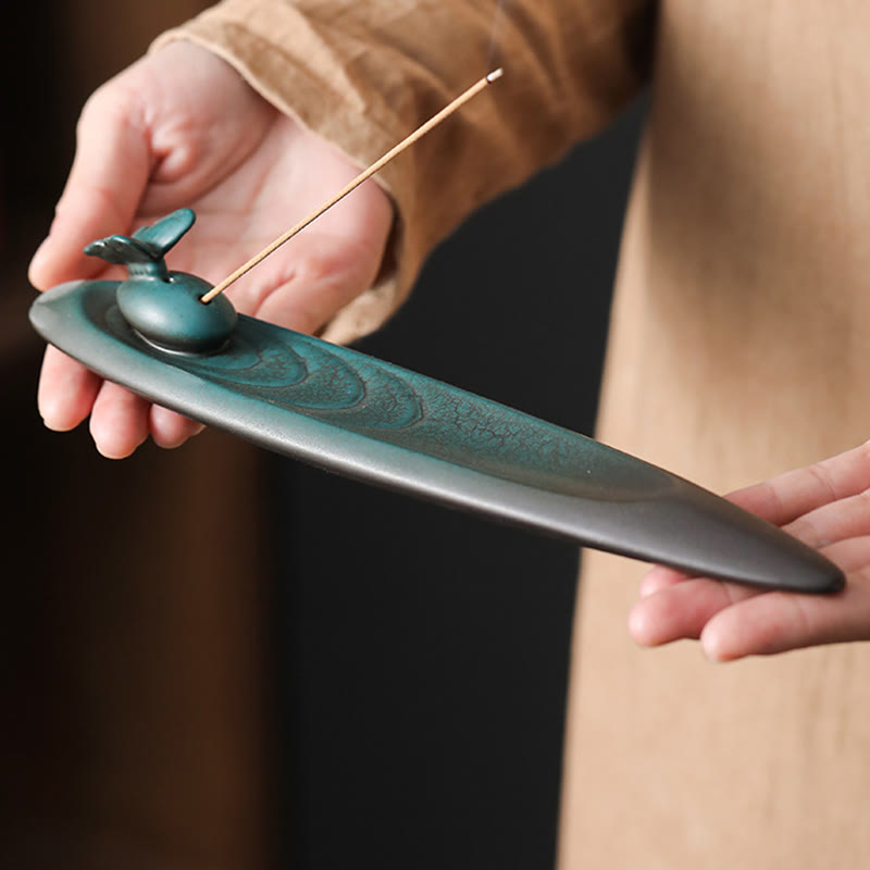 Ceramic Nature Incense Burner – Hands presenting butterfly design, delicate ceramic artistry